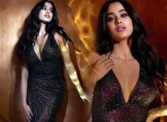 PICS: Janhvi Kapoor oozes oomph in silver deep-neck blouse and